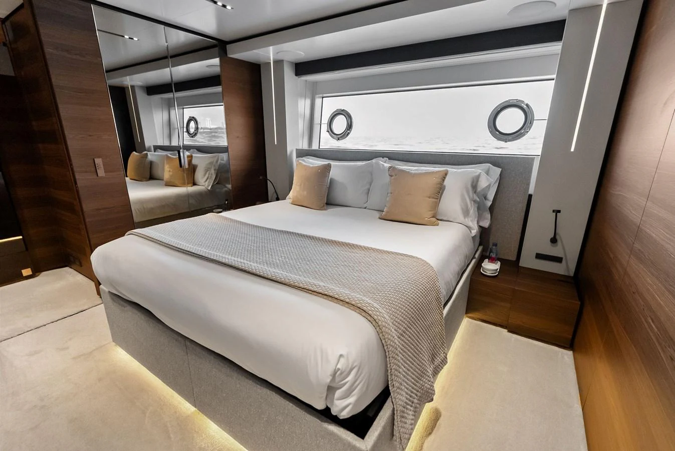 a bed in a room aboard LUMPASAURUS Yacht for Sale