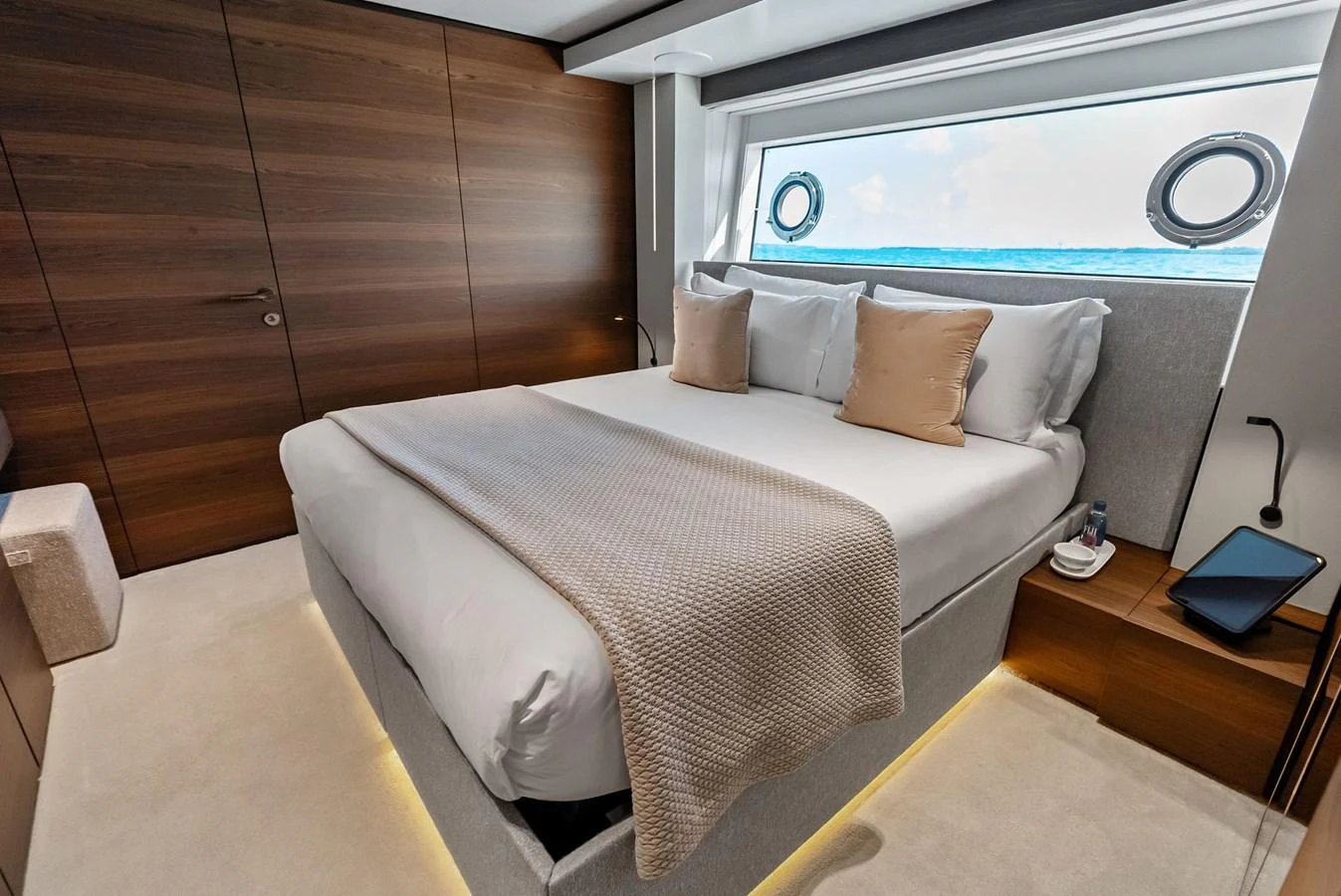 a bed in a room aboard LUMPASAURUS Yacht for Sale