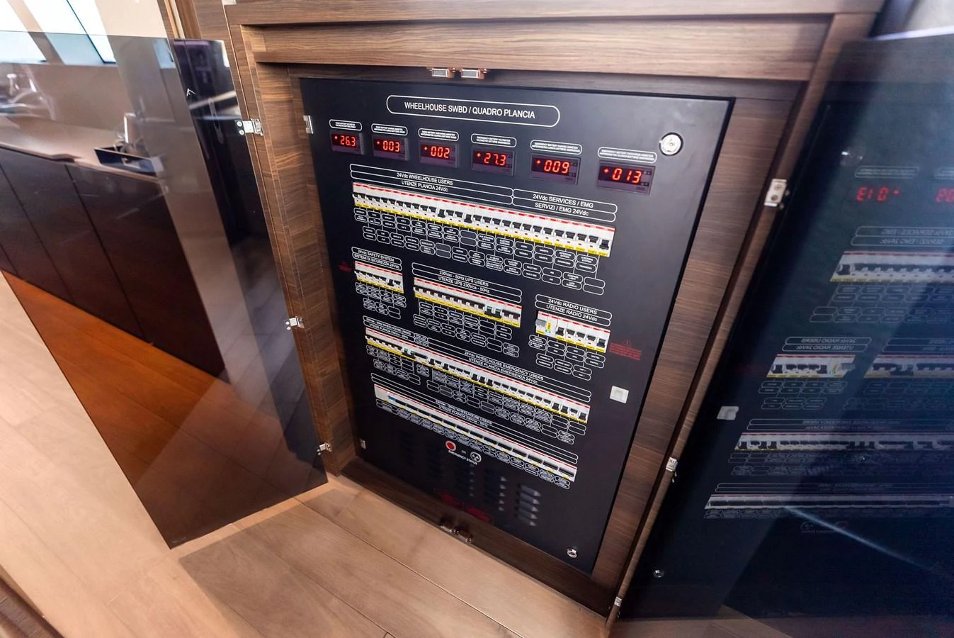 a computer on a table aboard LUMPASAURUS Yacht for Sale