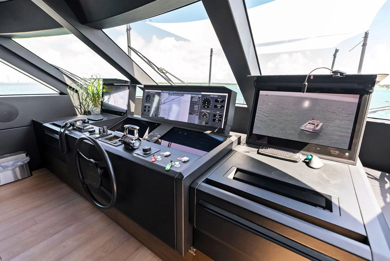 a room with computers and monitors aboard LUMPASAURUS Yacht for Sale