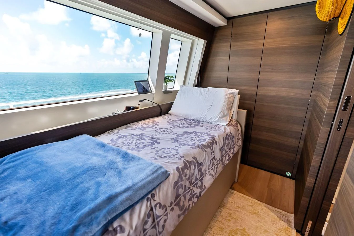 a couple of beds in a room aboard LUMPASAURUS Yacht for Sale
