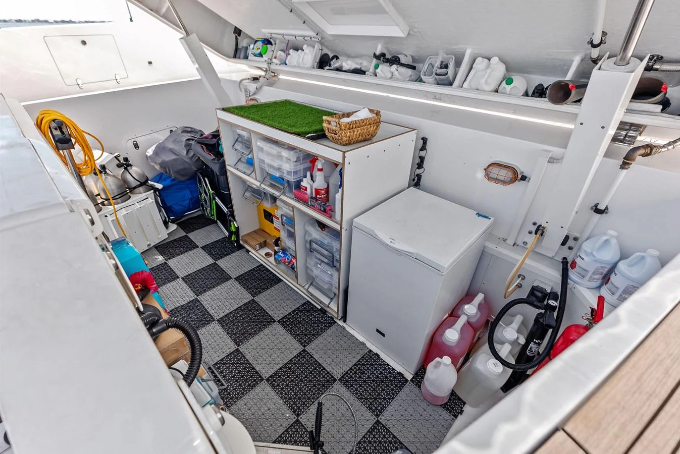 a kitchen with a sink and a dishwasher aboard LUMPASAURUS Yacht for Sale