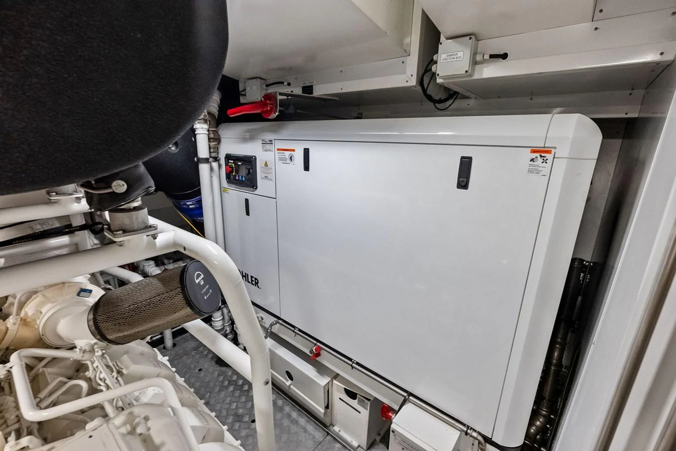 a machine with a white panel aboard LUMPASAURUS Yacht for Sale