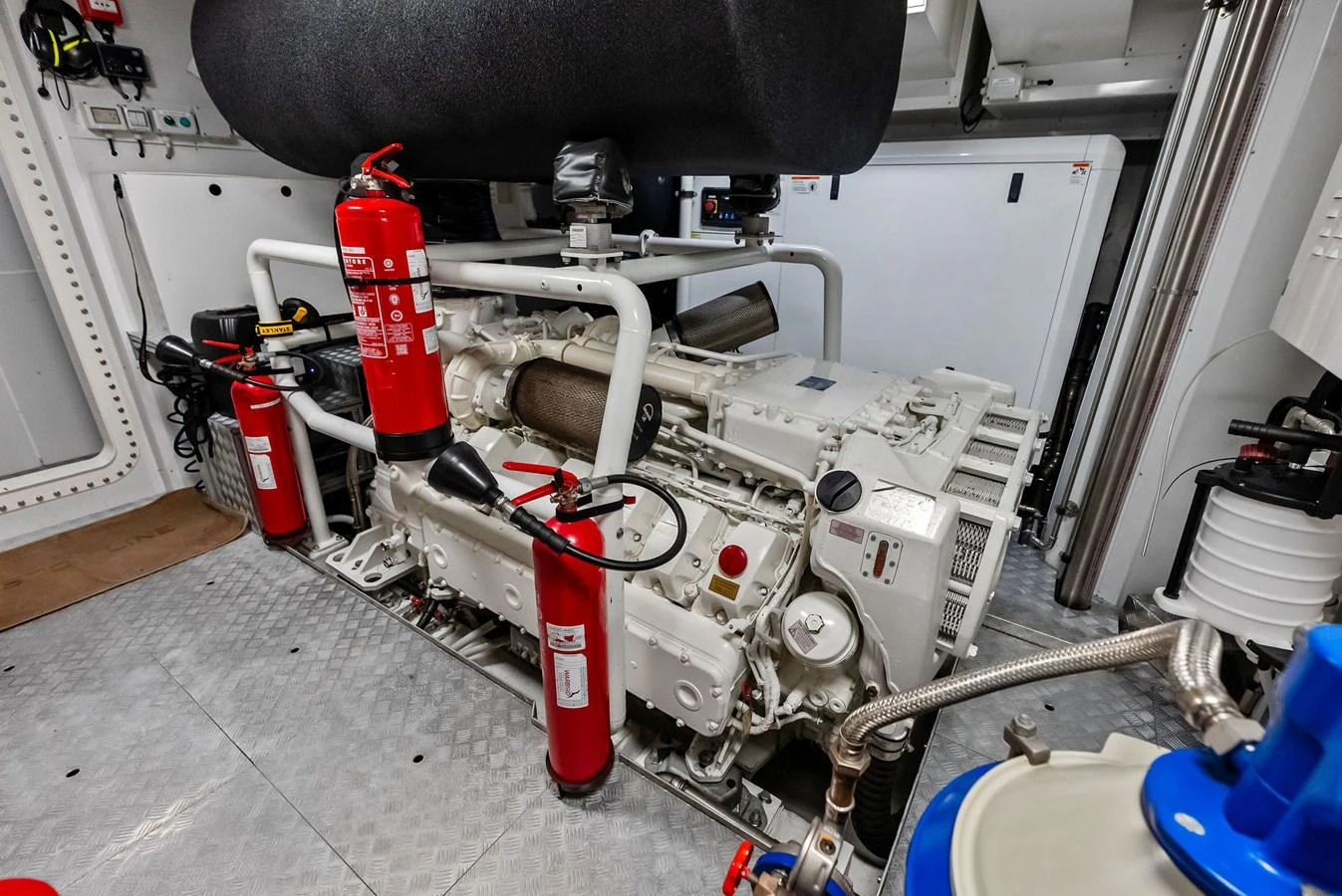 a machine with a large metal cylinder aboard LUMPASAURUS Yacht for Sale
