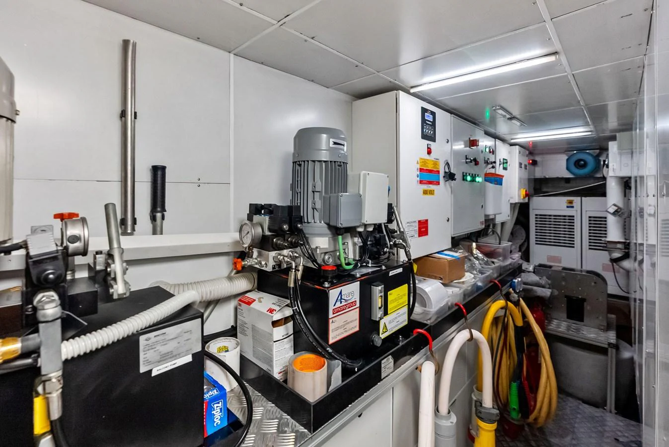 a room with machinery and equipment aboard LUMPASAURUS Yacht for Sale