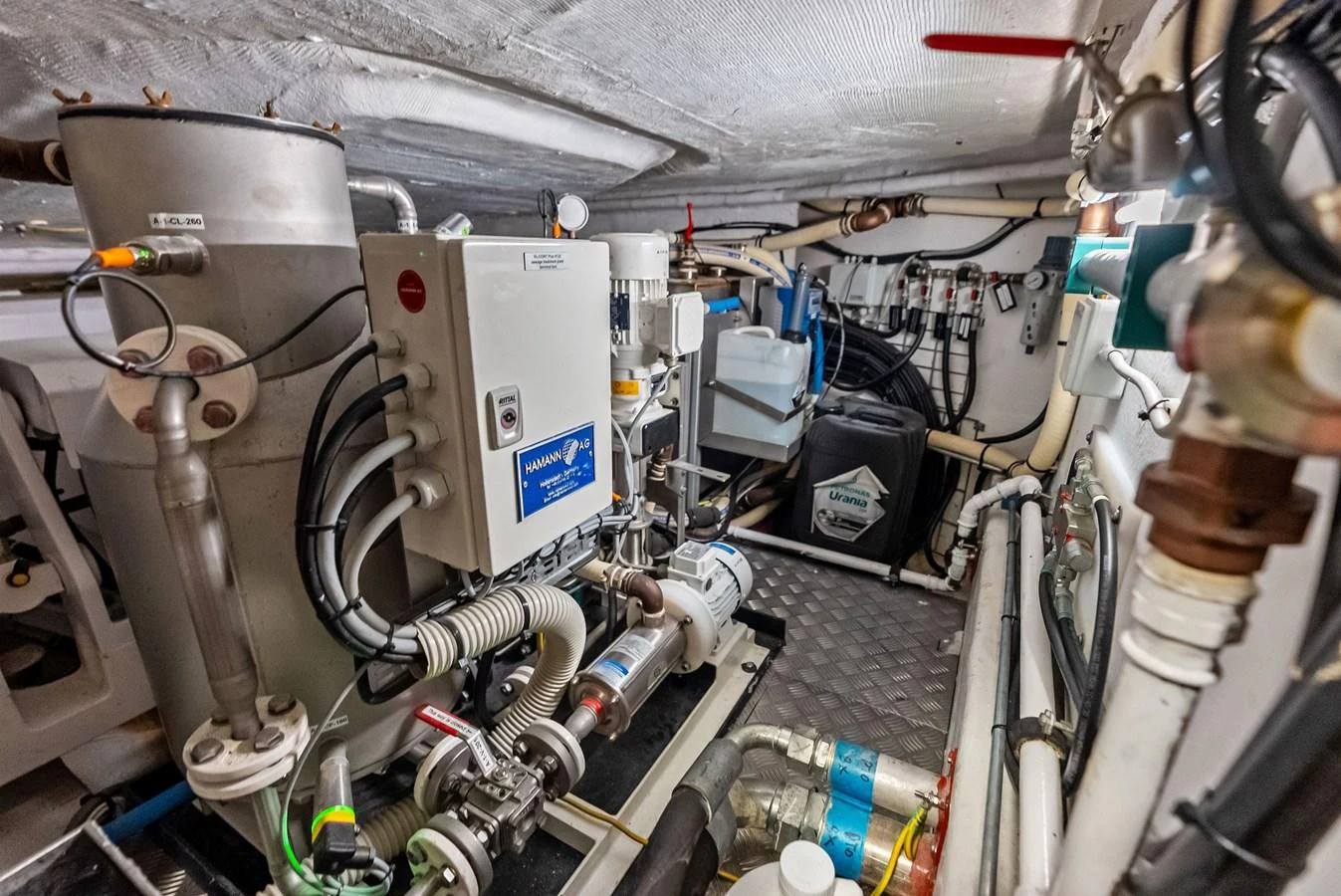 a car with a large engine aboard LUMPASAURUS Yacht for Sale