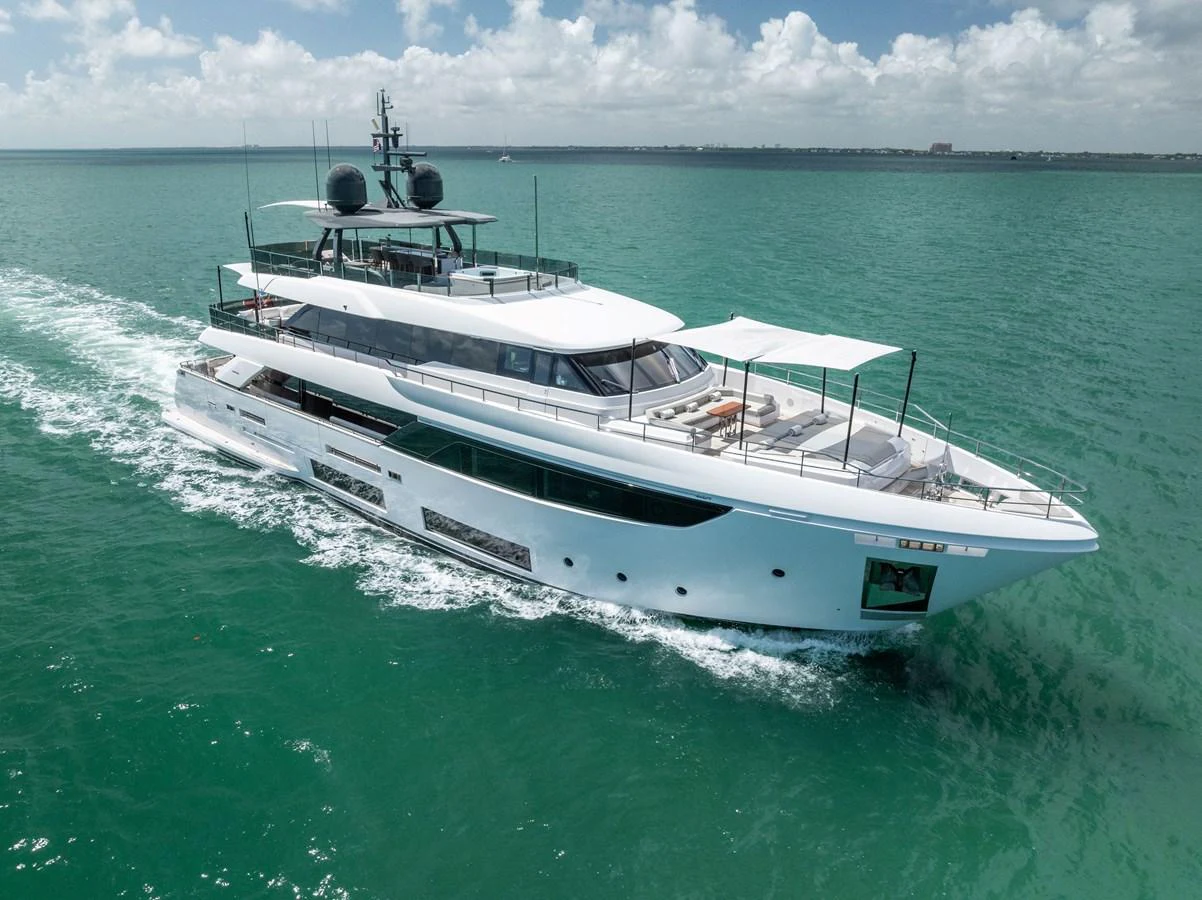 a white boat in the water aboard LUMPASAURUS Yacht for Sale