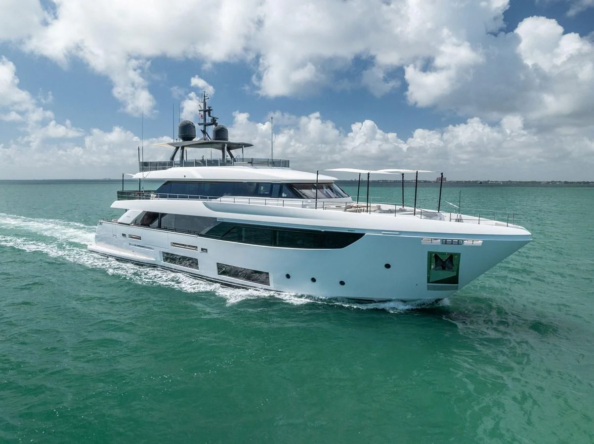 a white boat in the water aboard LUMPASAURUS Yacht for Sale