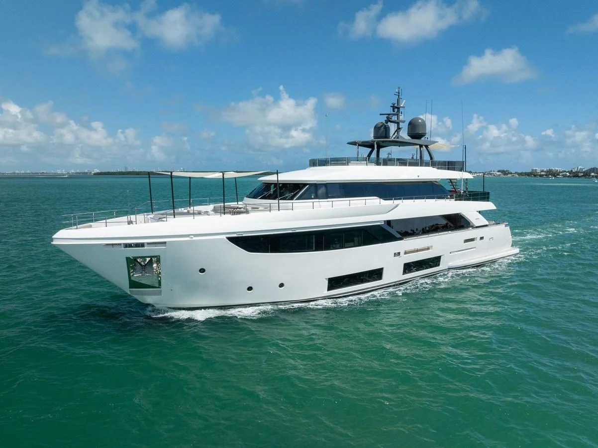 a white yacht in the water aboard LUMPASAURUS Yacht for Sale