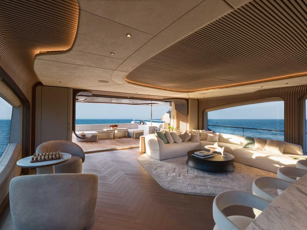 The spacious salon offers panoramic ocean views and luxurious seating arrangements. aboard PESA II Yacht for Sale