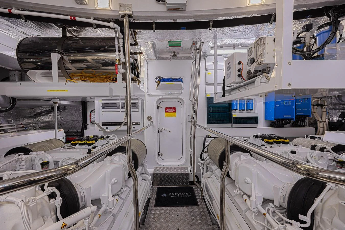 The image showcases a meticulously organized engine room with advanced machinery and equipment. aboard HIDEOUT Yacht for Sale