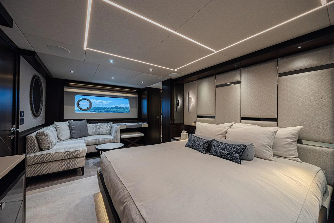 The master stateroom offers a luxurious and spacious retreat with elegant furnishings and modern lighting. aboard HIDEOUT Yacht for Sale