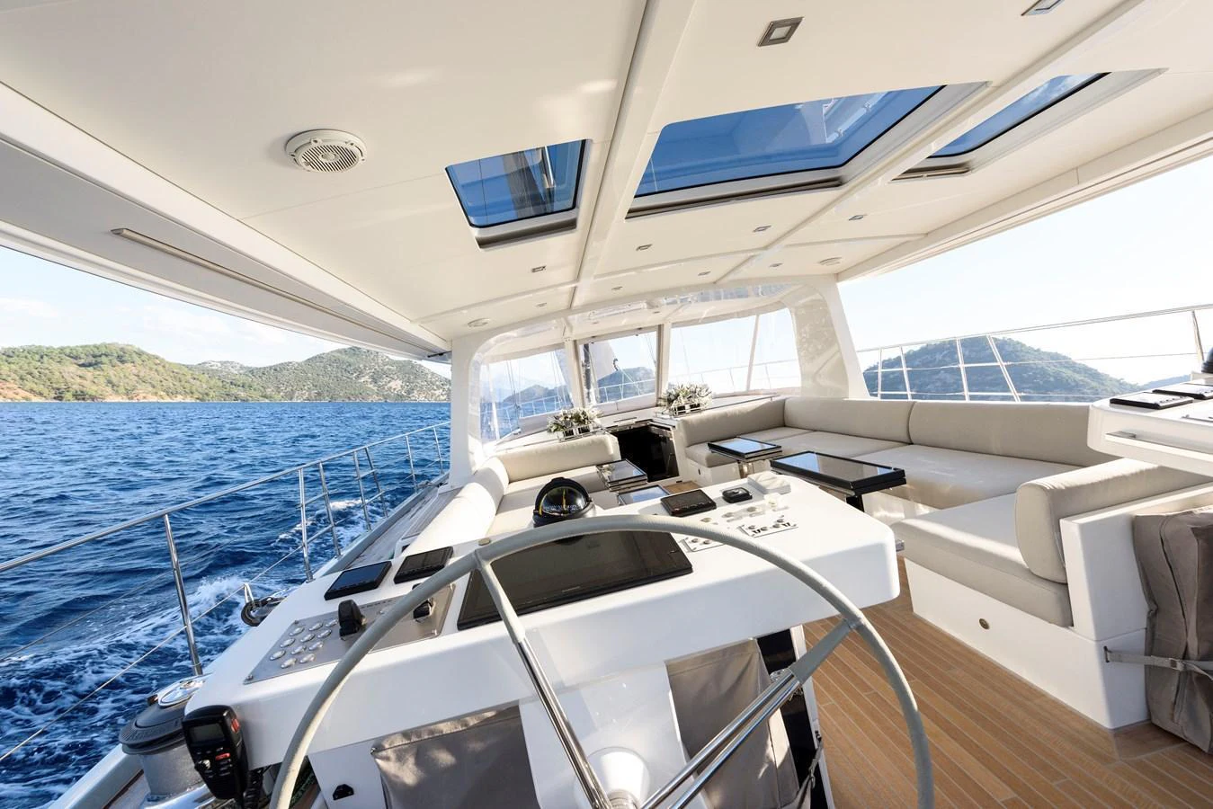 The yacht's helm offers a spacious and luxurious area with panoramic views and modern amenities. aboard MISHI Yacht for Sale