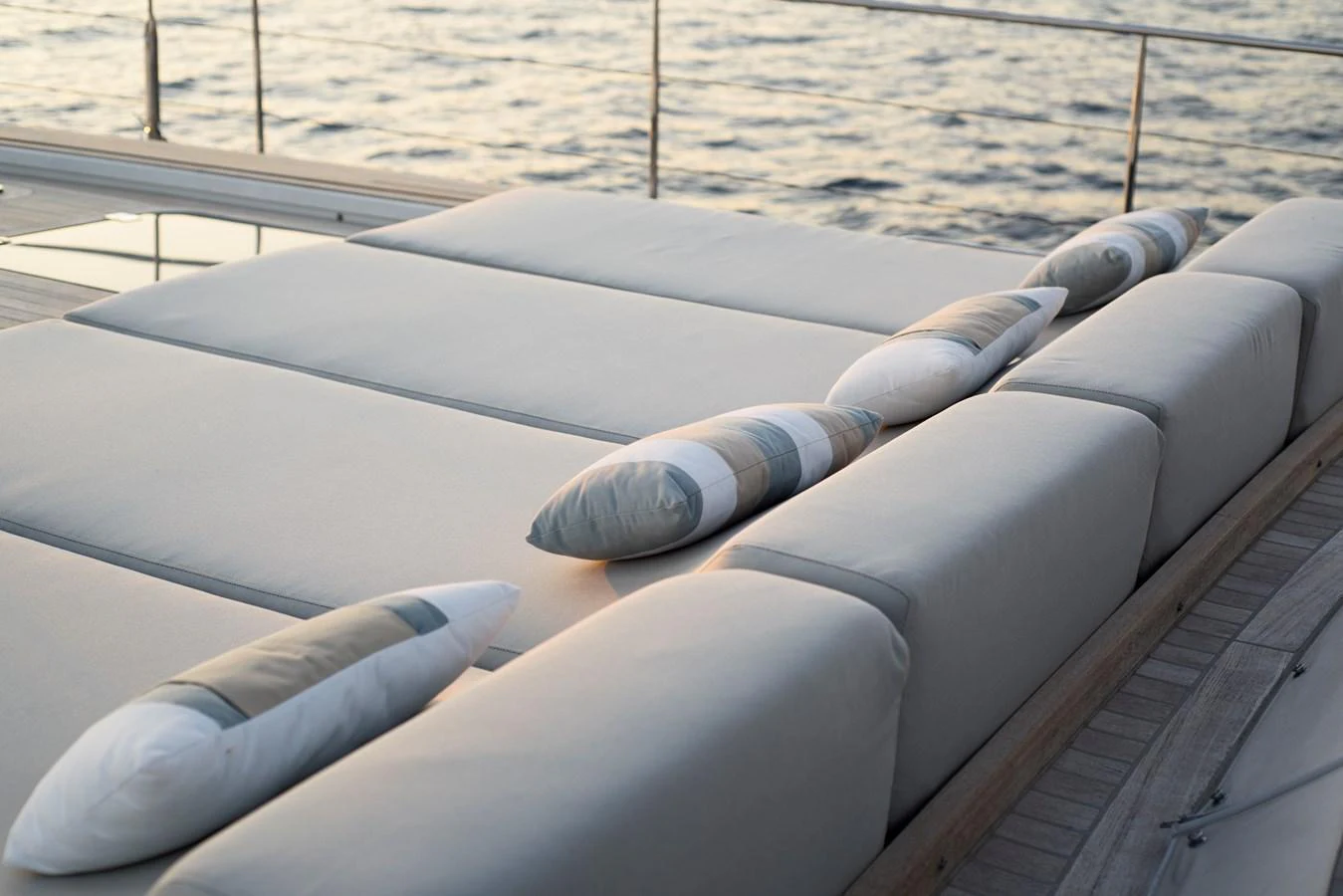 Luxurious sun pads on the sundeck offer a perfect spot for relaxation with a view of the sea. aboard MISHI Yacht for Sale