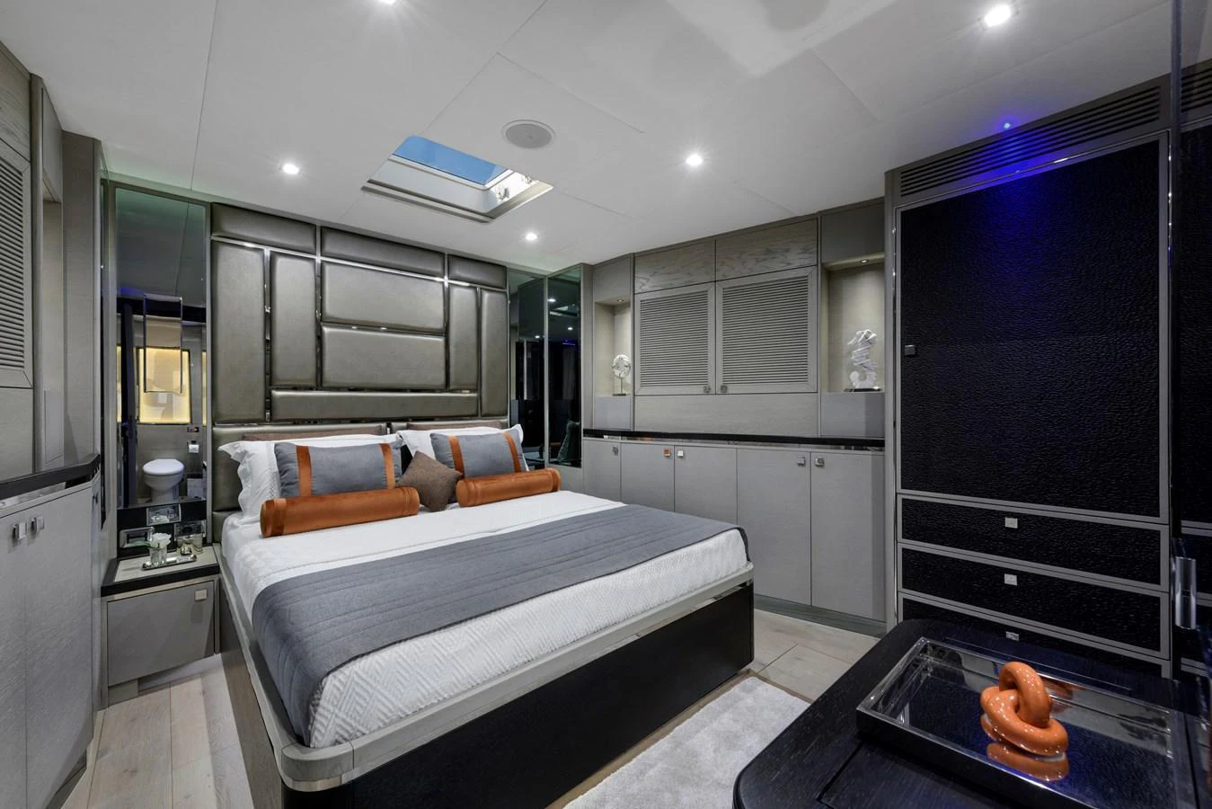 The master stateroom features a luxurious bed with elegant decor and ample storage space. aboard MISHI Yacht for Sale