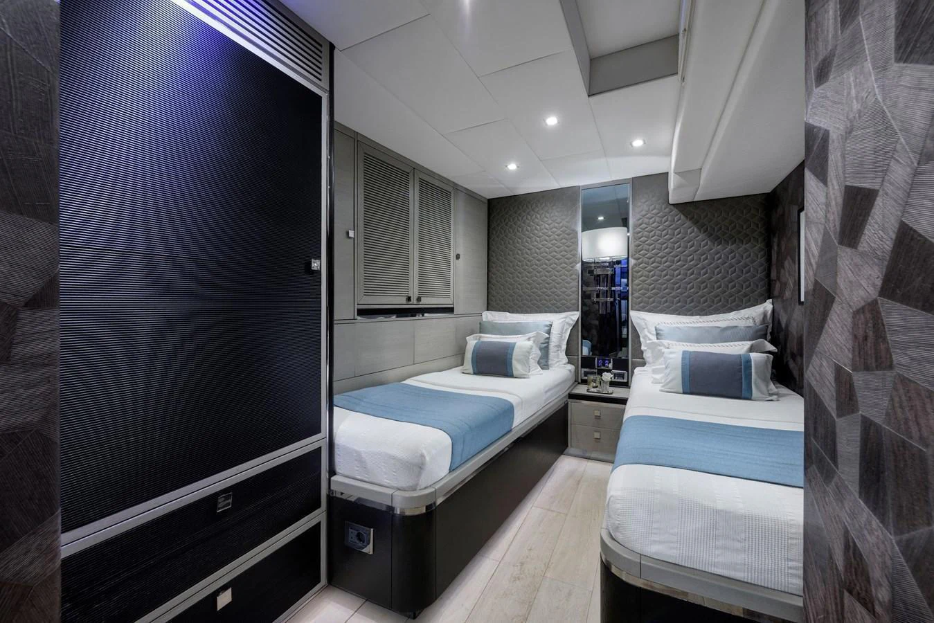 The guest stateroom features two twin beds with elegant bedding and modern decor. aboard MISHI Yacht for Sale