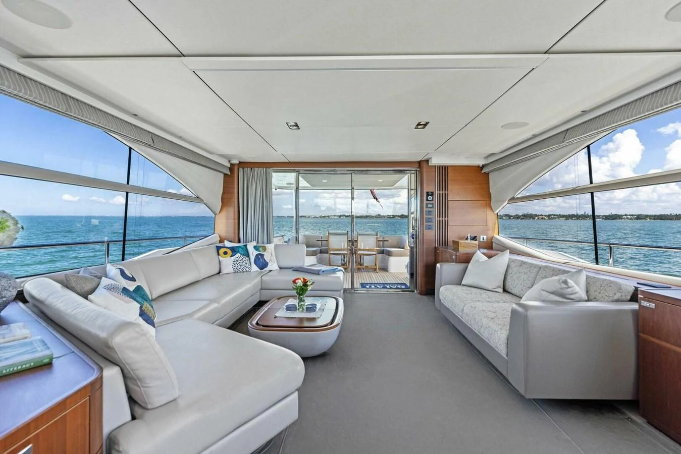 The salon offers a spacious and luxurious seating area with panoramic views of the sea. aboard 3BBOYS Yacht for Sale