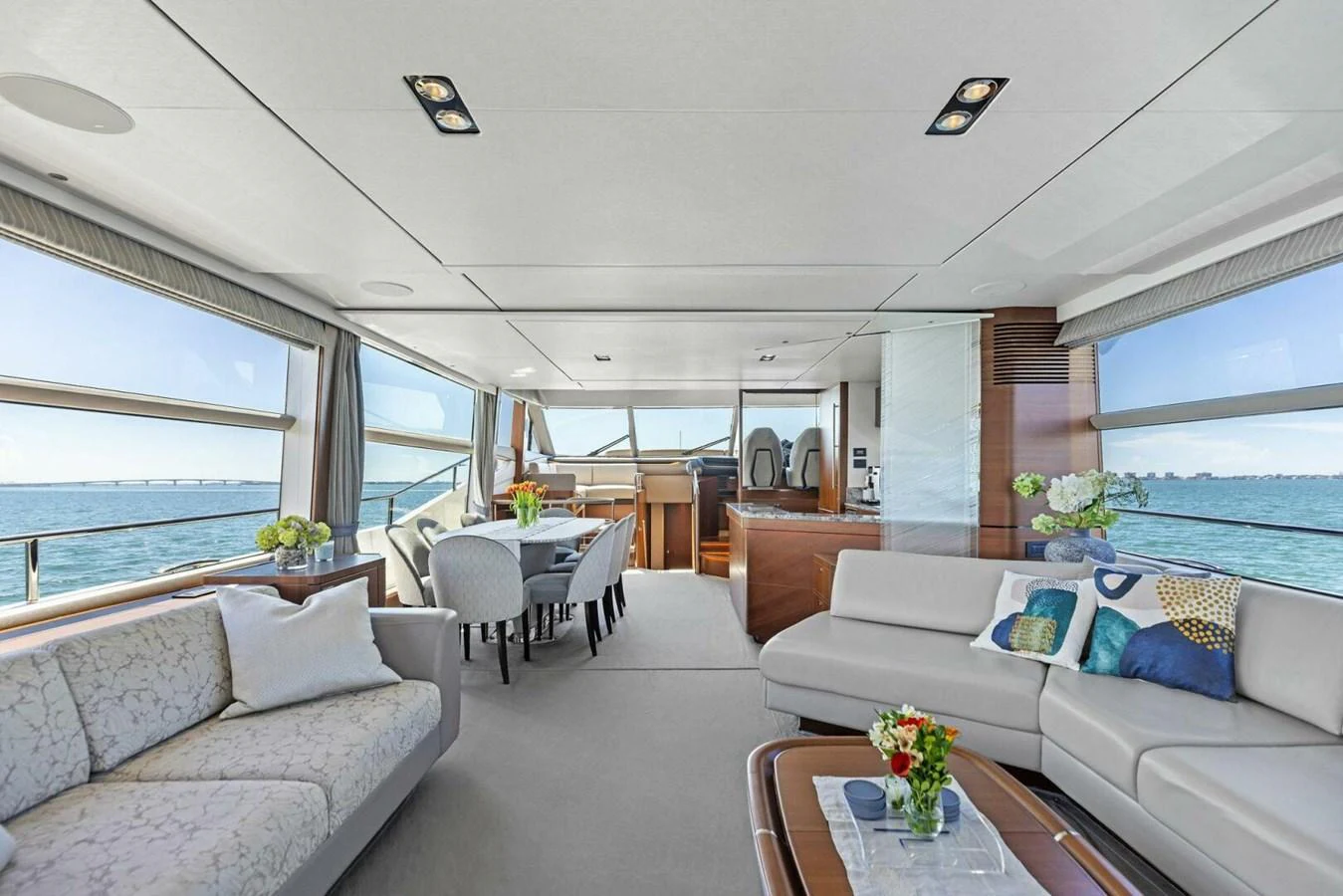 The salon offers a spacious and elegantly furnished area with panoramic views of the sea. aboard 3BBOYS Yacht for Sale