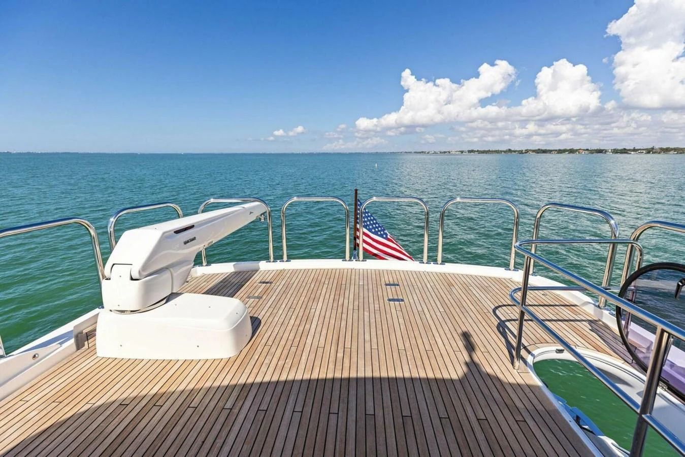 The aft deck offers a spacious area with a beautiful view of the open sea. aboard 3BBOYS Yacht for Sale