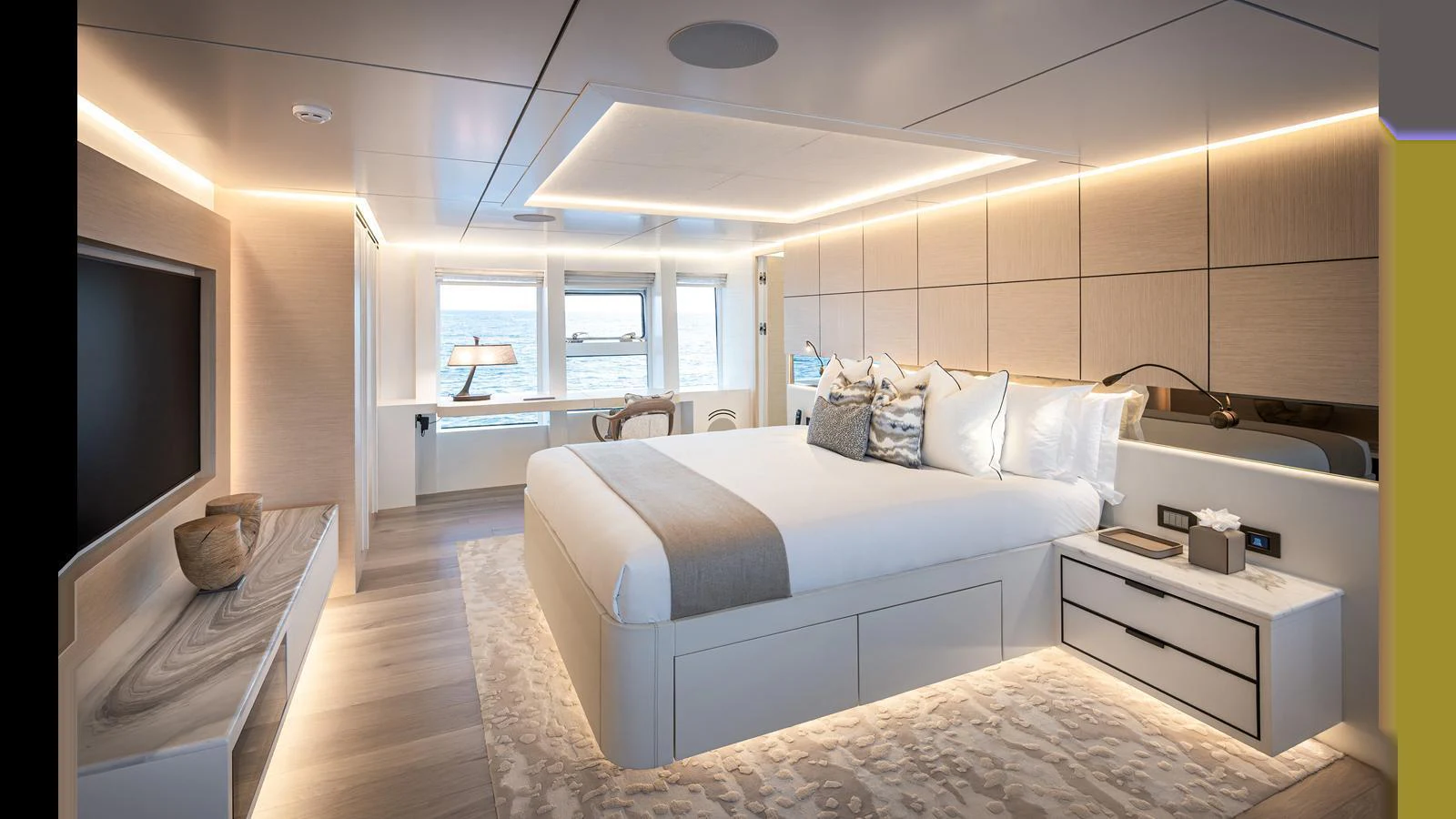 The master stateroom exudes luxury with its spacious layout, modern design, and elegant lighting. aboard NUMARINE 37XP-21 Yacht for Sale