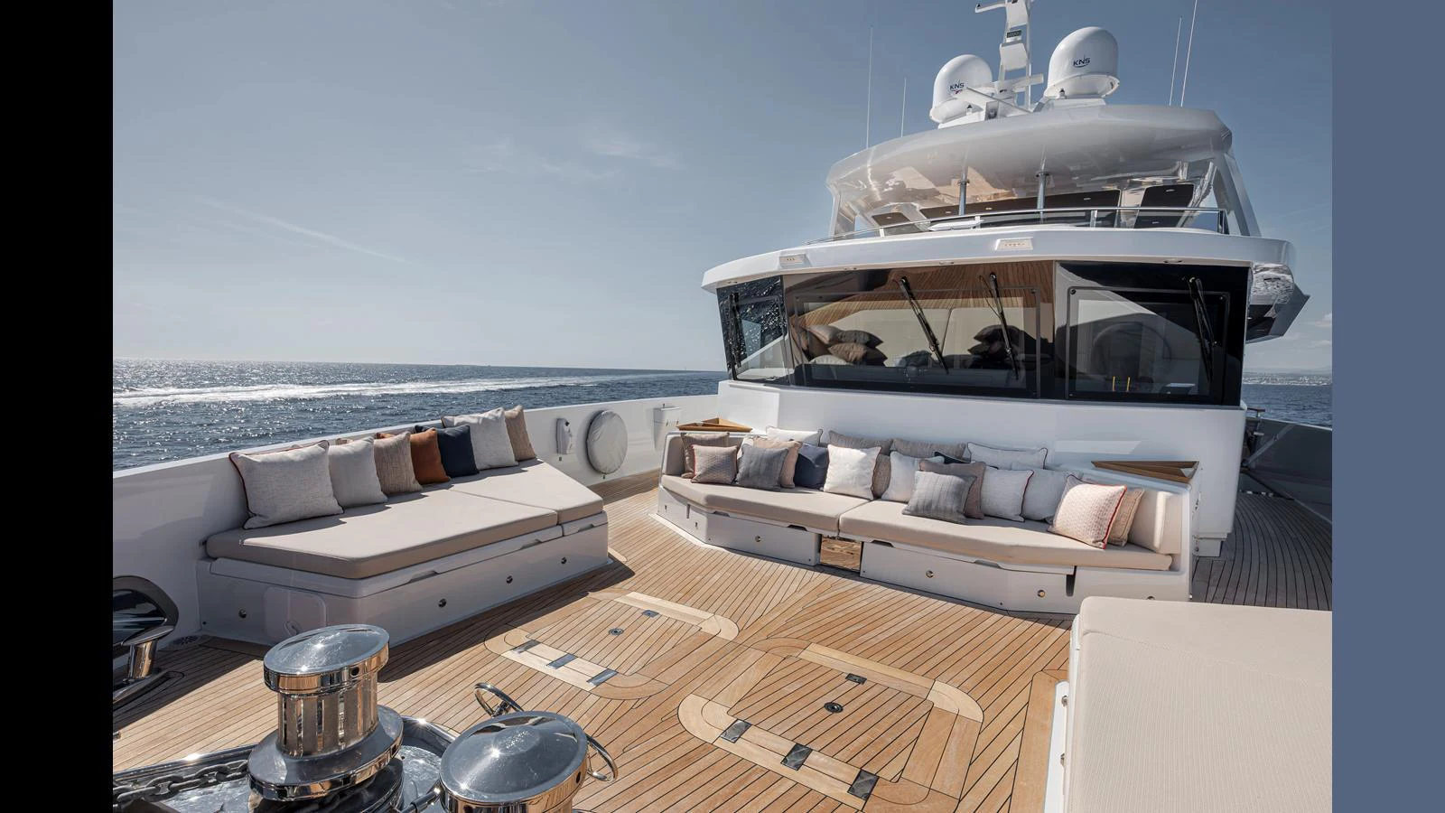 The aft deck offers a spacious and luxurious lounging area with ample seating and a stunning view of the sea. aboard NUMARINE 37XP-21 Yacht for Sale
