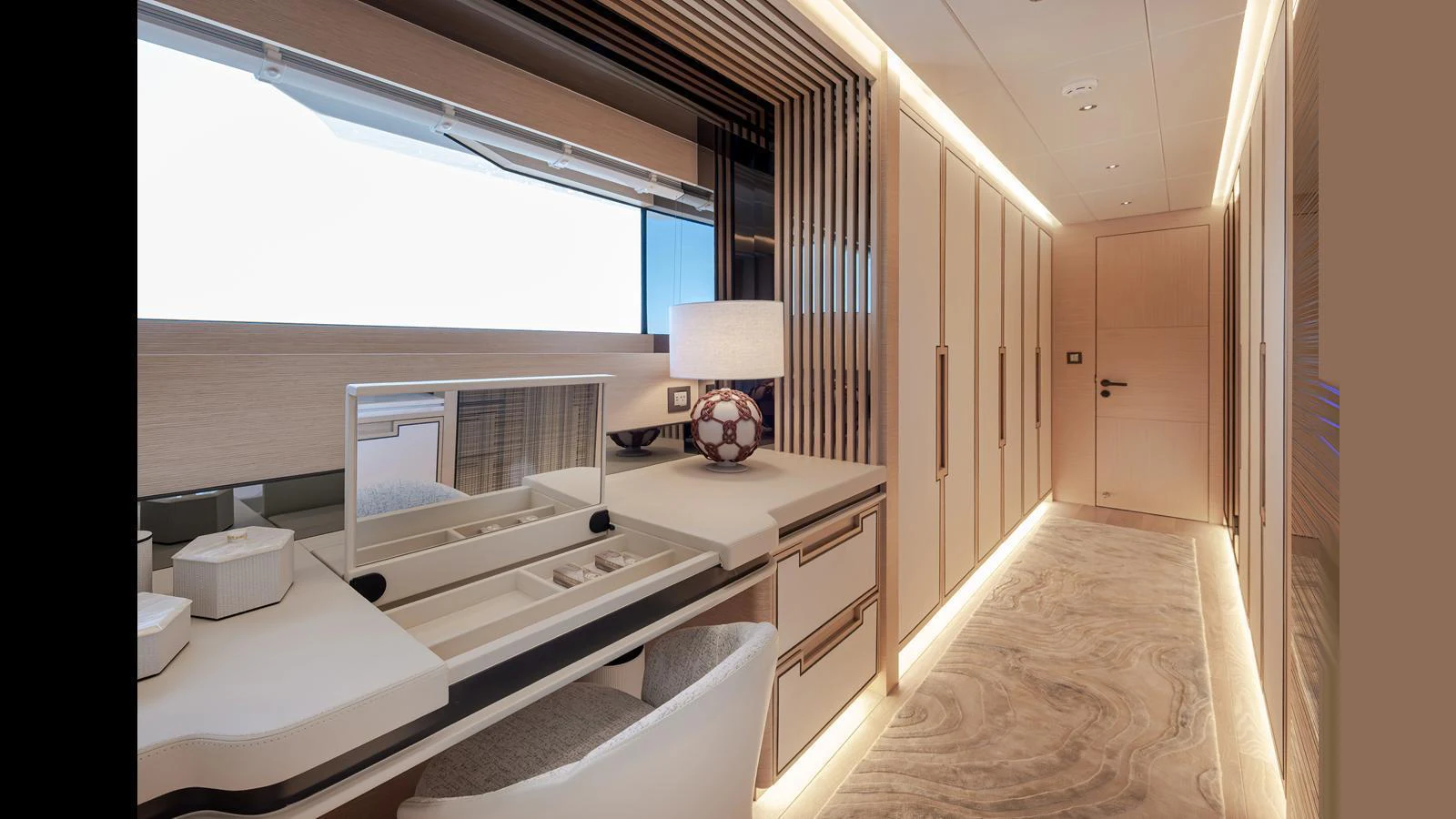 The yacht's interior hallway features elegant lighting and modern decor. aboard NUMARINE 37XP-21 Yacht for Sale