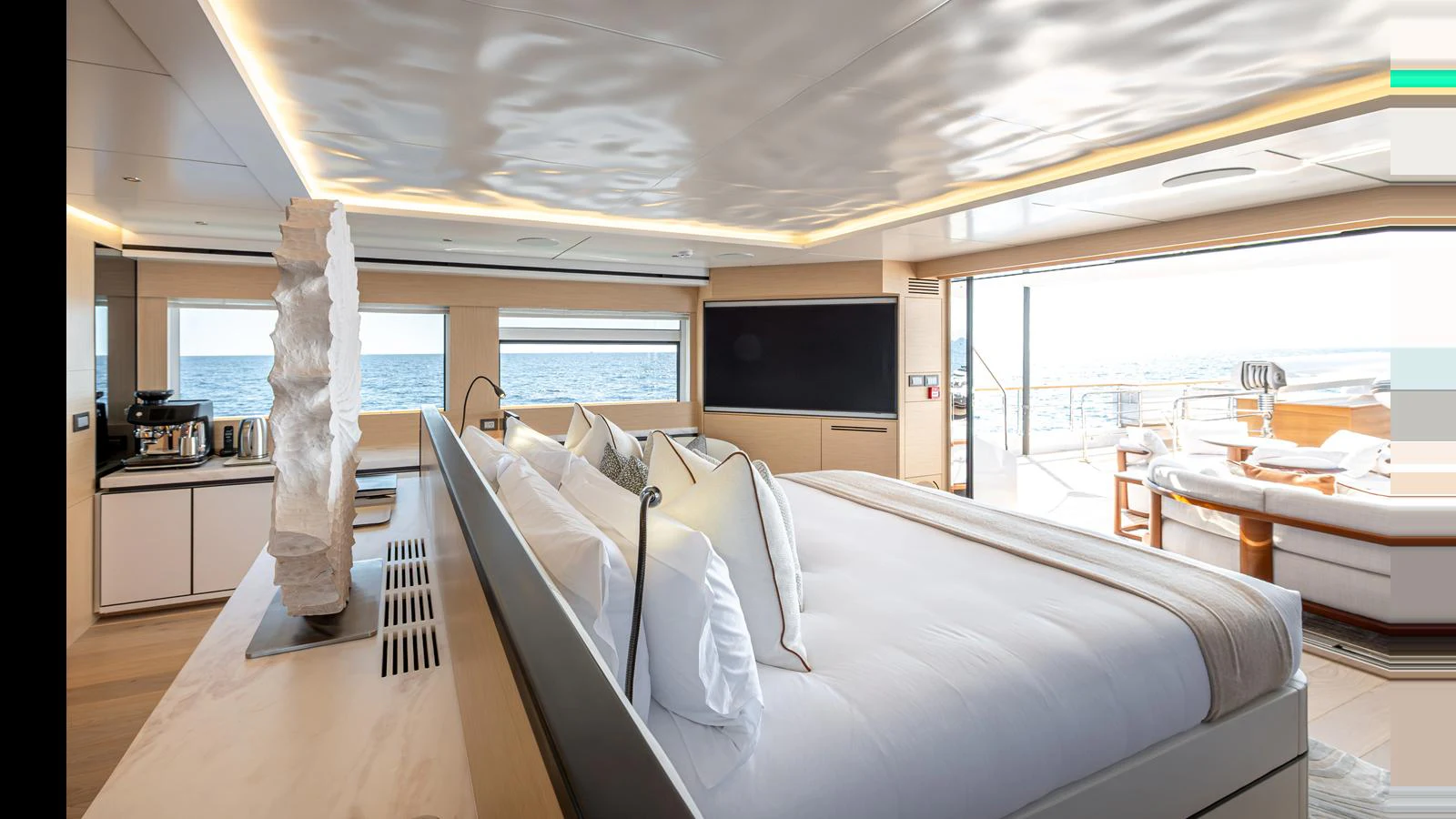 The master stateroom offers a luxurious and spacious retreat with stunning ocean views. aboard NUMARINE 37XP-21 Yacht for Sale
