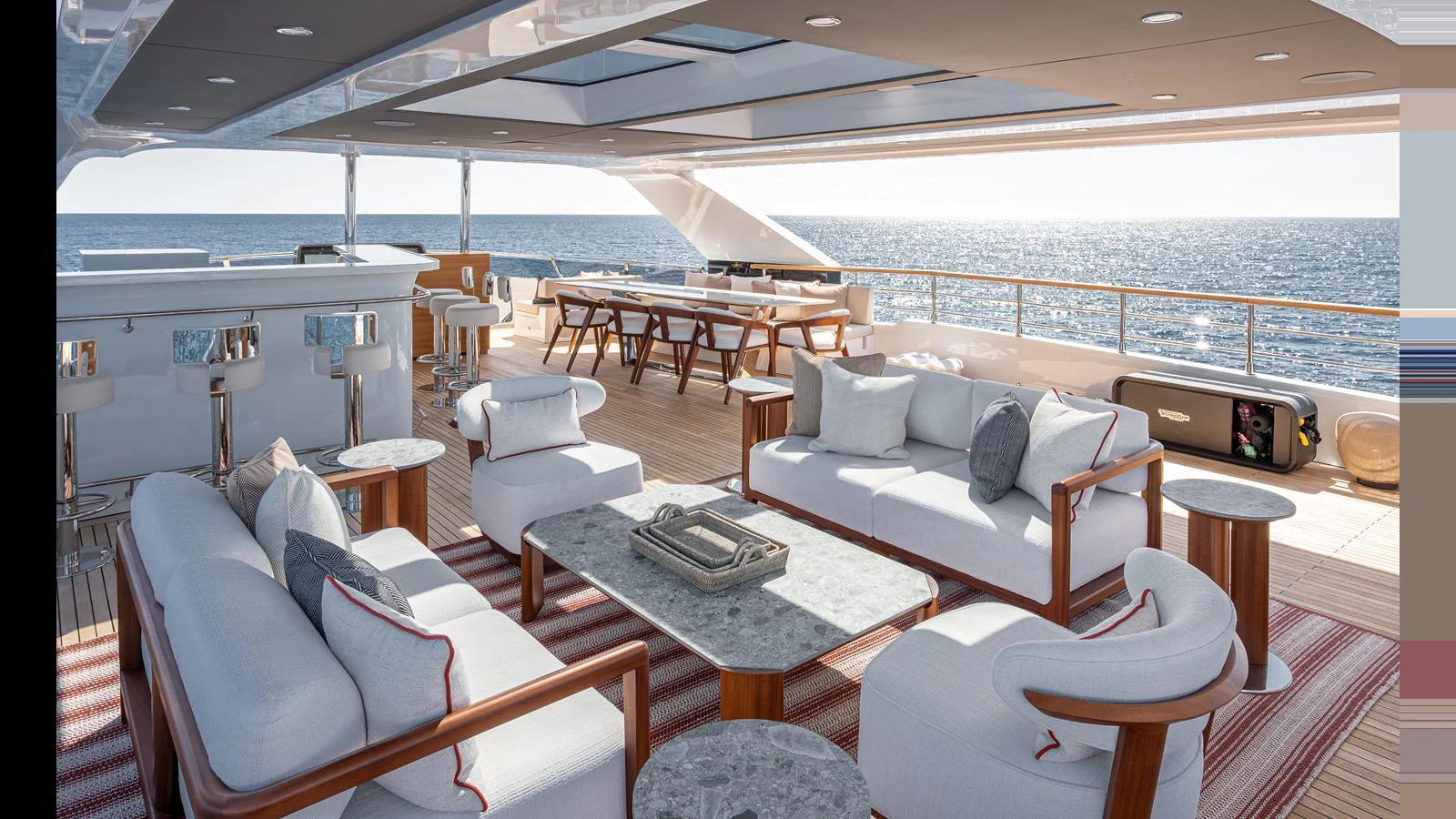 The aft deck features luxurious seating with a stunning ocean view. aboard NUMARINE 37XP-21 Yacht for Sale