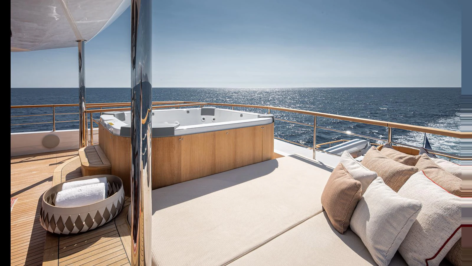 The sundeck features a luxurious hot tub and comfortable sun loungers with a stunning ocean view. aboard NUMARINE 37XP-21 Yacht for Sale
