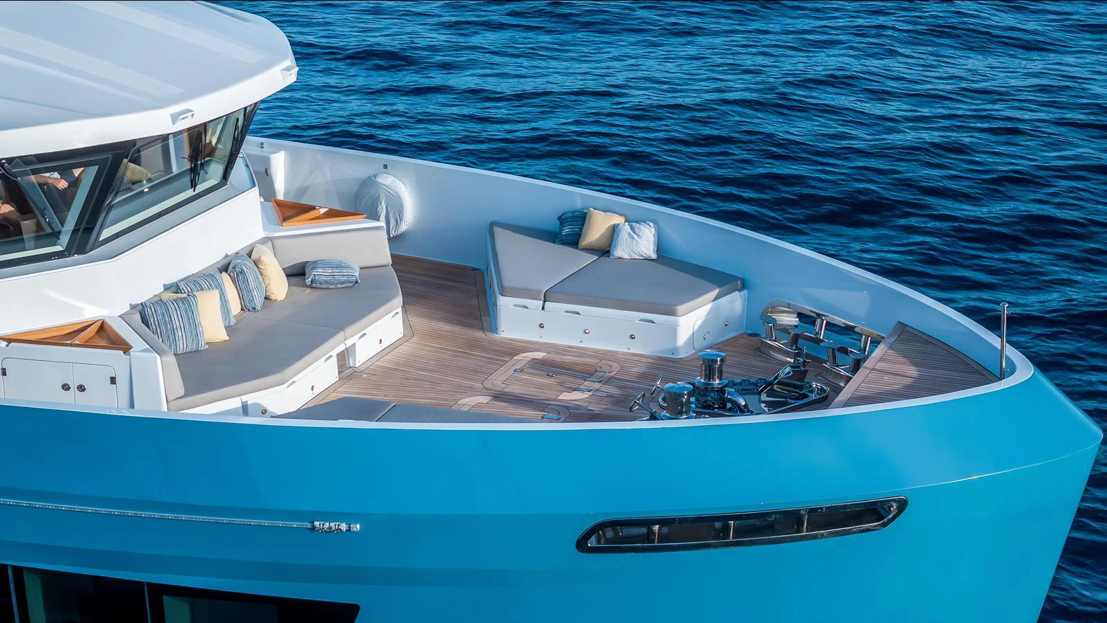 The yacht's foredeck features a spacious lounging area with comfortable seating and stunning ocean views. aboard NUMARINE 37XP-21 Yacht for Sale