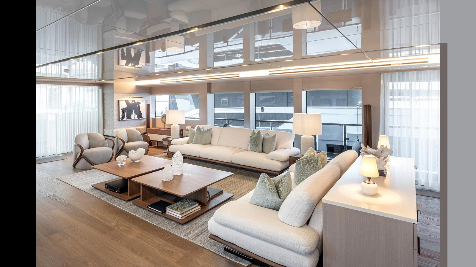 The salon features a spacious and elegantly designed seating area with modern furnishings and ample natural light. aboard NUMARINE 37XP-21 Yacht for Sale