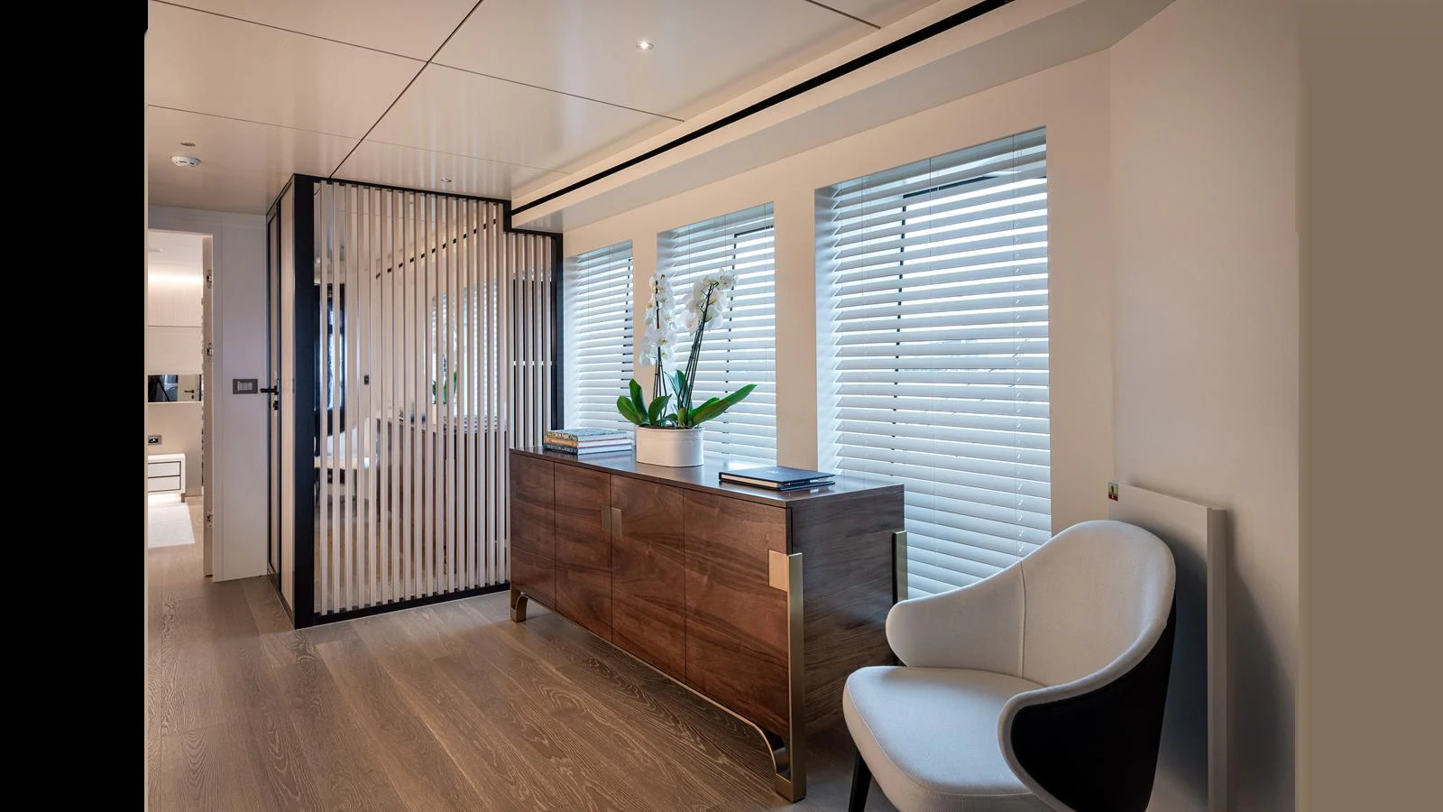 The yacht's interior features a modern and elegant design with a comfortable seating area and stylish decor. aboard NUMARINE 37XP-21 Yacht for Sale