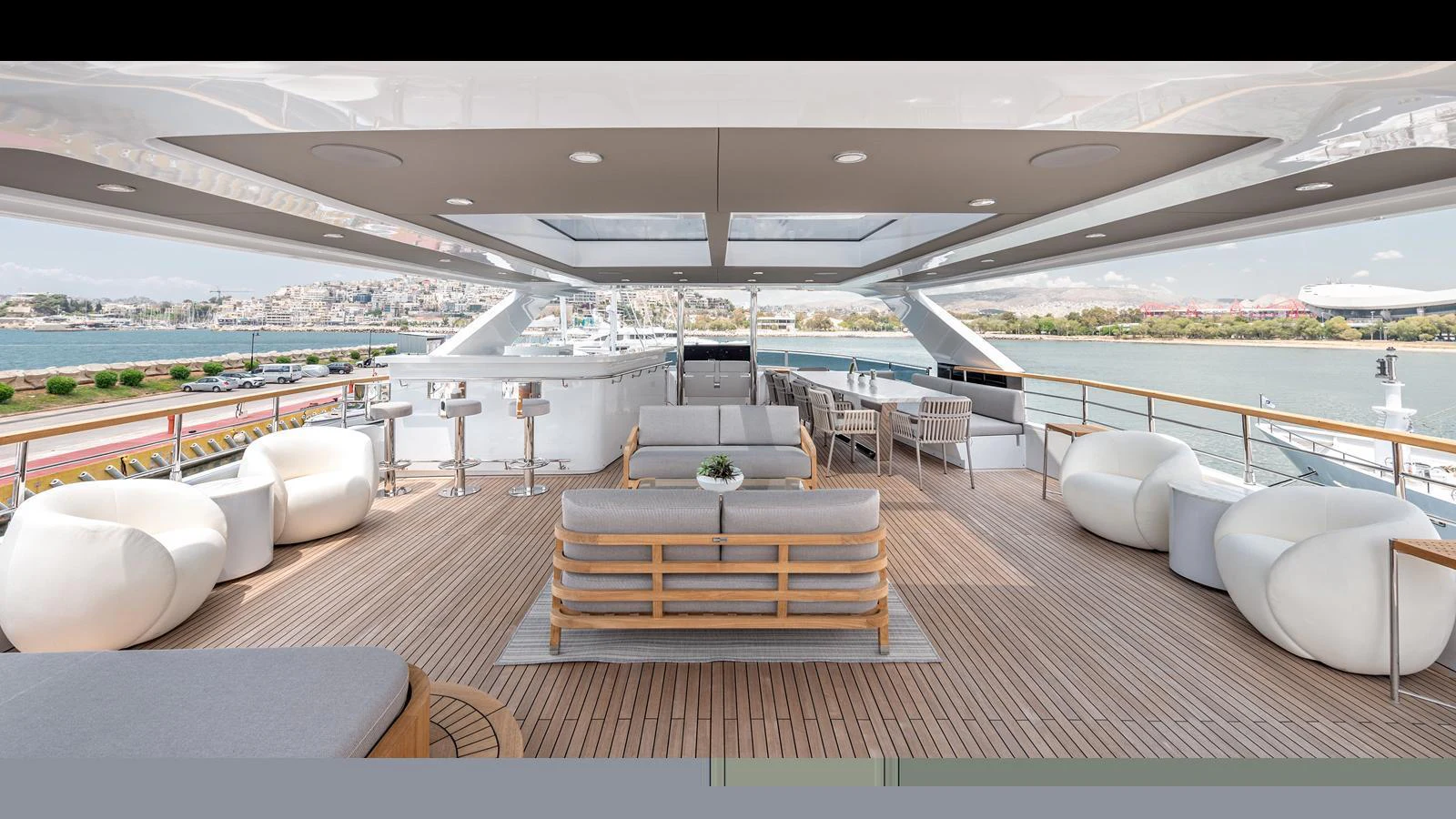 The sundeck offers a spacious and elegant area for relaxation with ample seating and panoramic views. aboard NUMARINE 37XP-21 Yacht for Sale