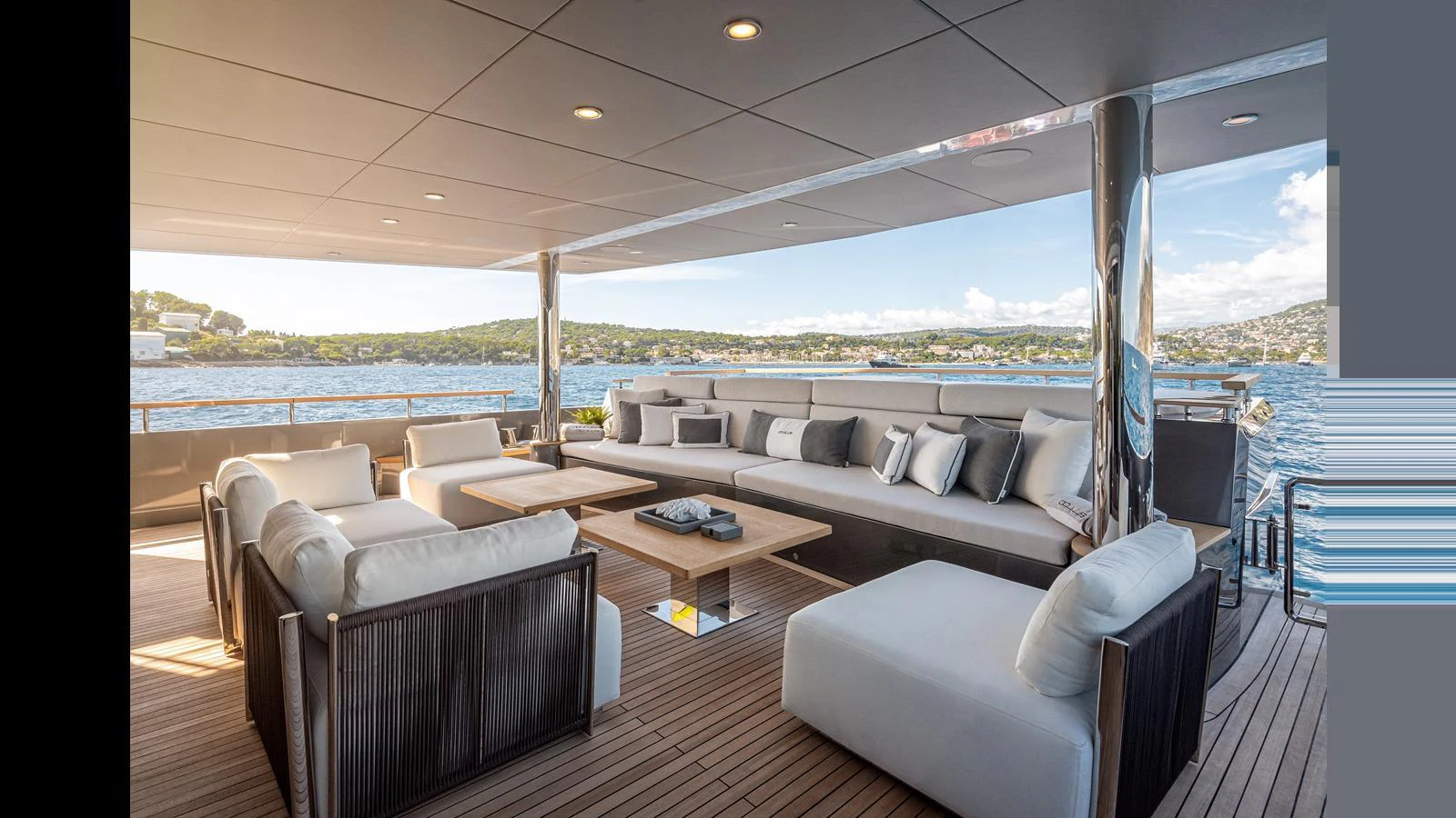 The aft deck features a spacious and luxurious seating area with panoramic views of the water. aboard NUMARINE 37XP-21 Yacht for Sale