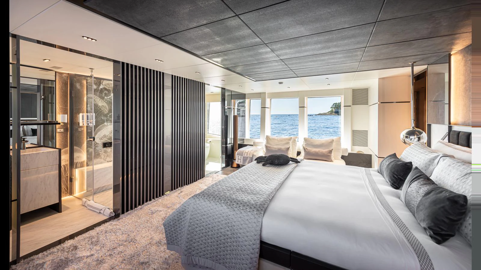 The master stateroom offers a luxurious and spacious retreat with stunning ocean views. aboard NUMARINE 37XP-21 Yacht for Sale