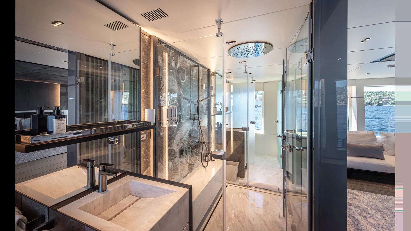 The yacht's bathroom features a modern design with luxurious fixtures and a spacious layout. aboard NUMARINE 37XP-21 Yacht for Sale