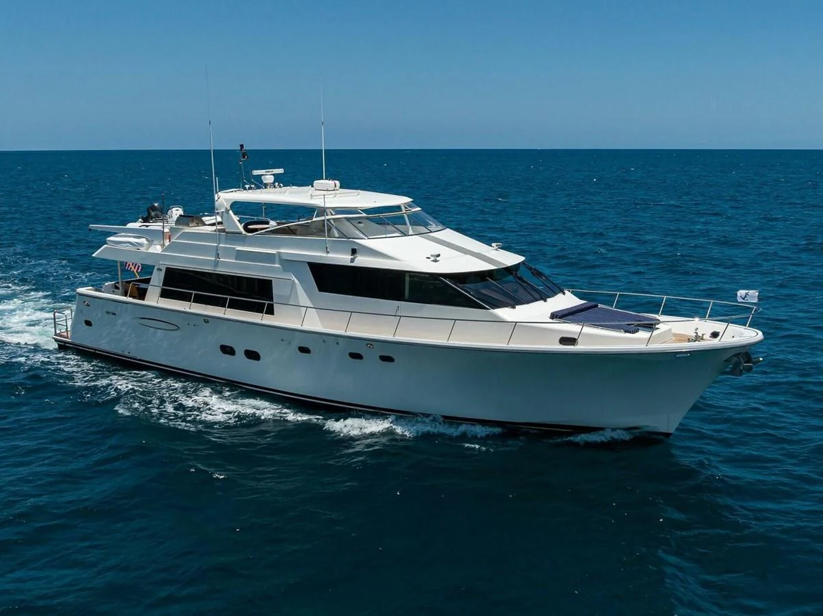 a white yacht in the water aboard JULE Yacht for Sale