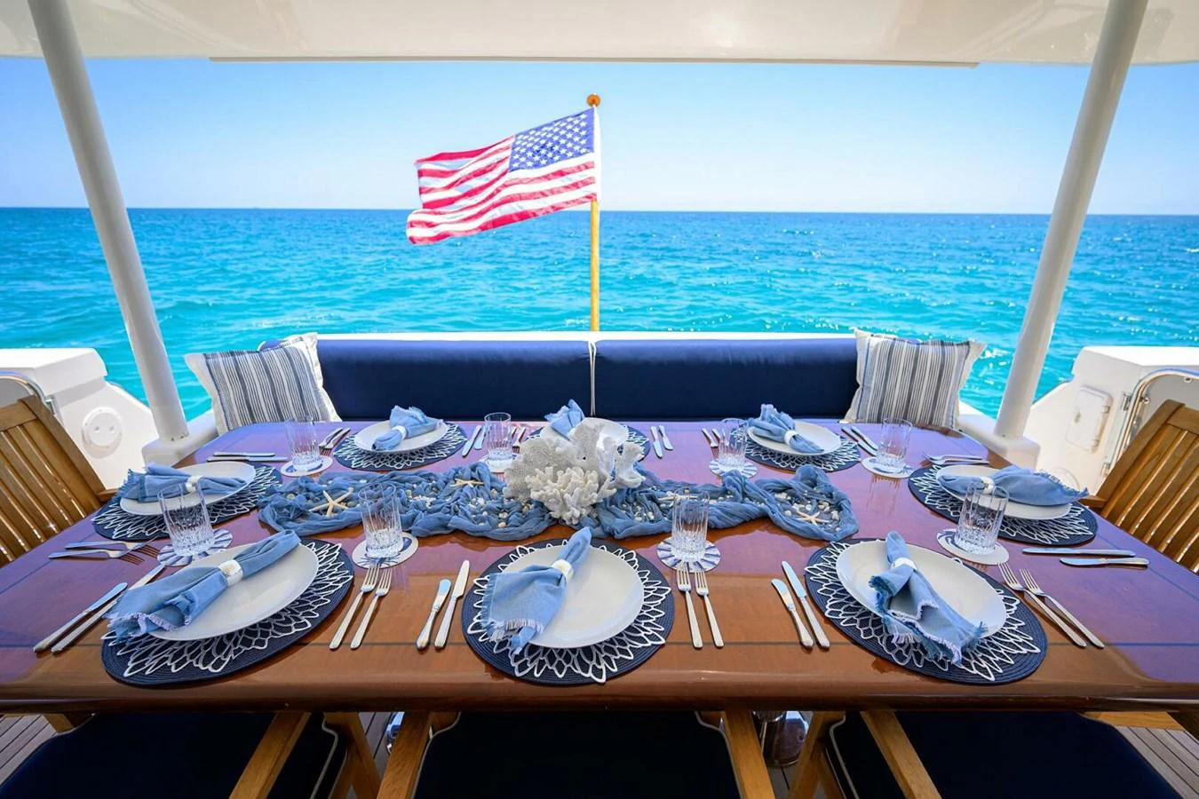 a table set for a dinner aboard JULE Yacht for Sale