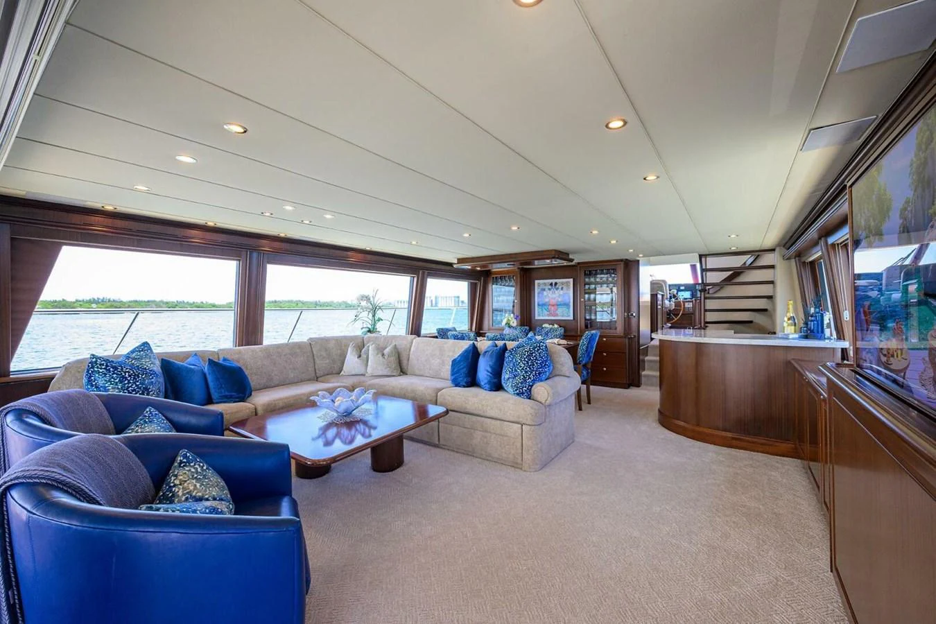 a living room with a large window aboard JULE Yacht for Sale