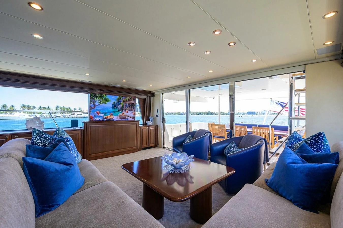 a living room with a large window aboard JULE Yacht for Sale