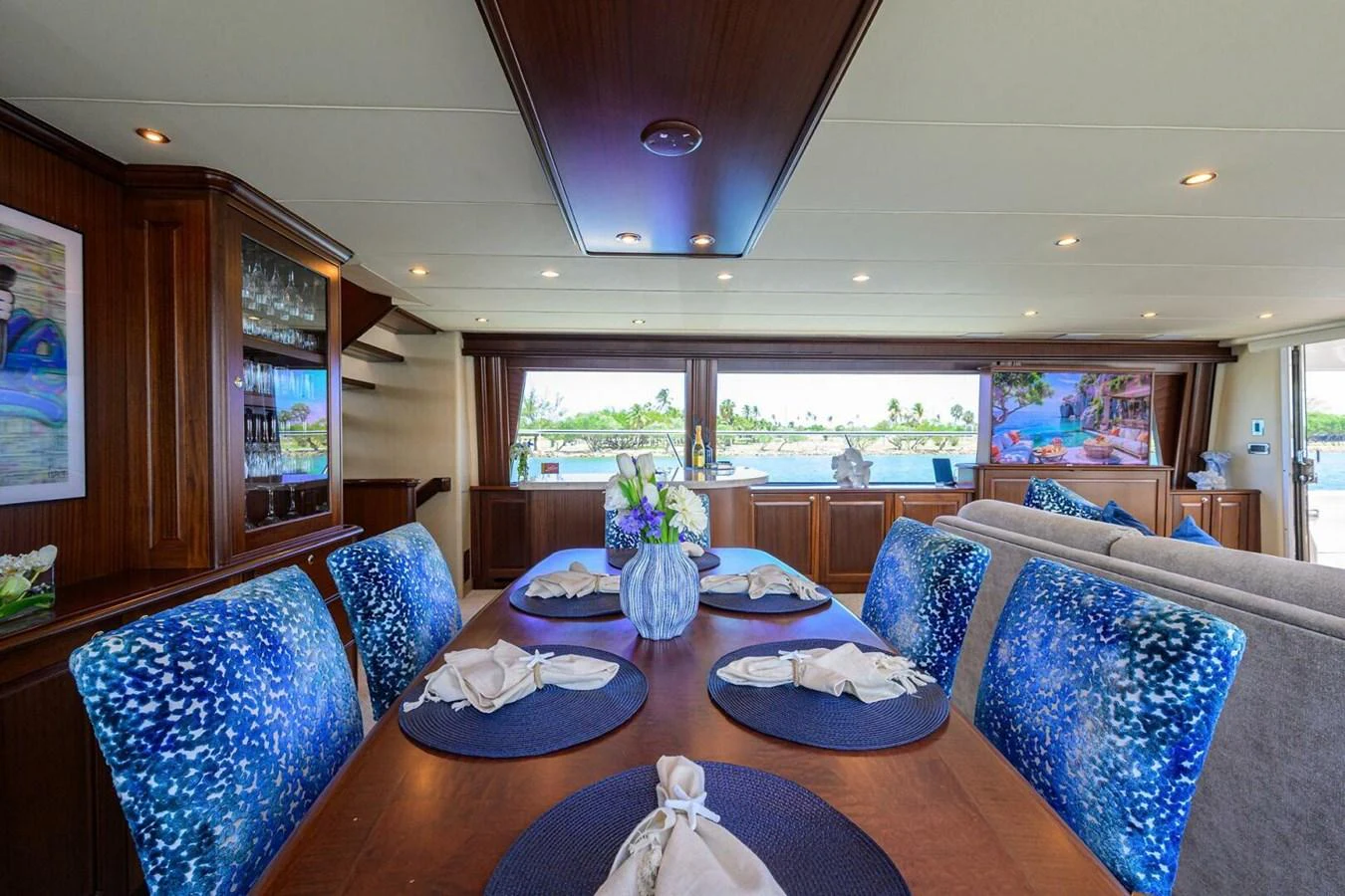 a dining room with a table and chairs aboard JULE Yacht for Sale