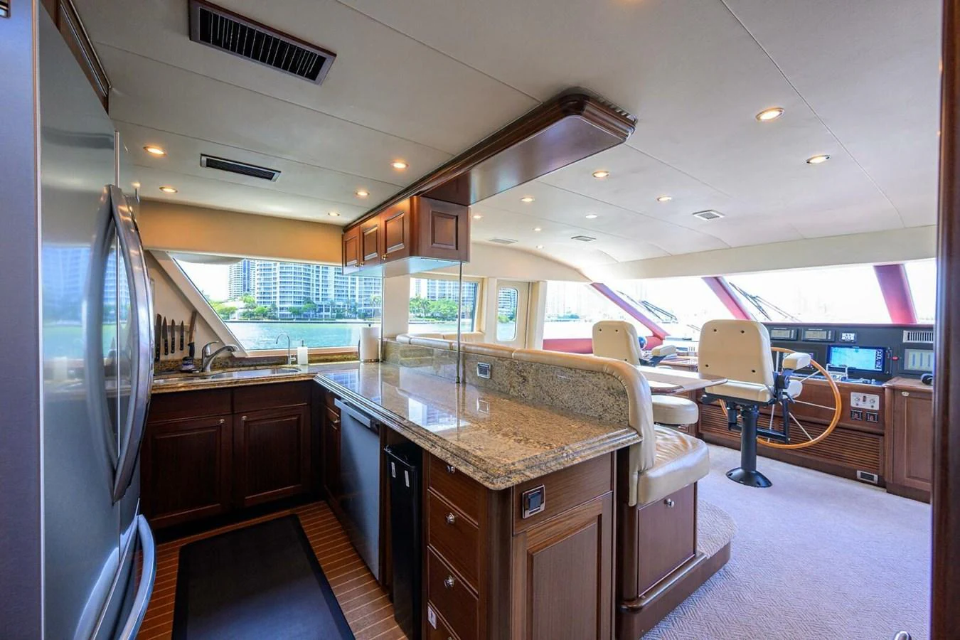 a kitchen with a large island aboard JULE Yacht for Sale