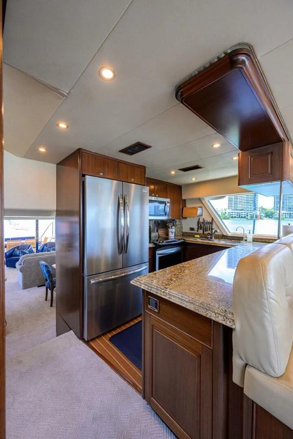 a kitchen with a large island aboard JULE Yacht for Sale
