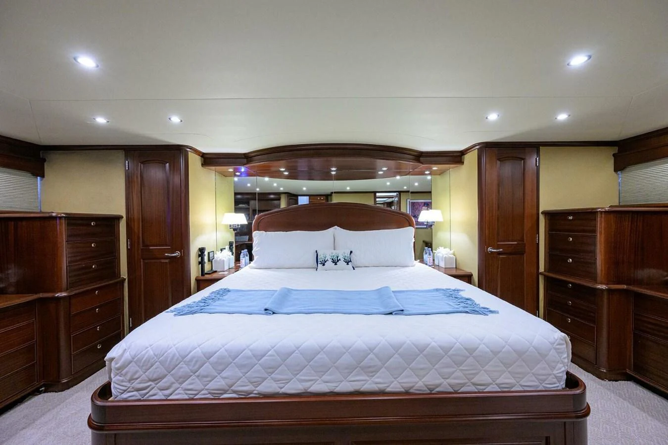 a large bedroom with a large bed aboard JULE Yacht for Sale