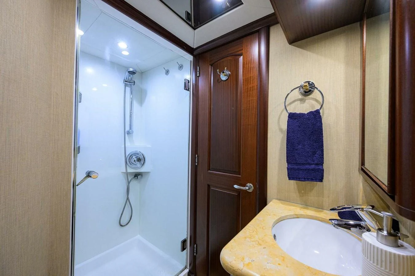 a bathroom with a shower and sink aboard JULE Yacht for Sale