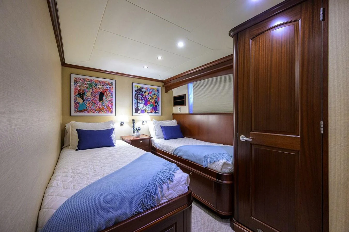 a room with two beds aboard JULE Yacht for Sale
