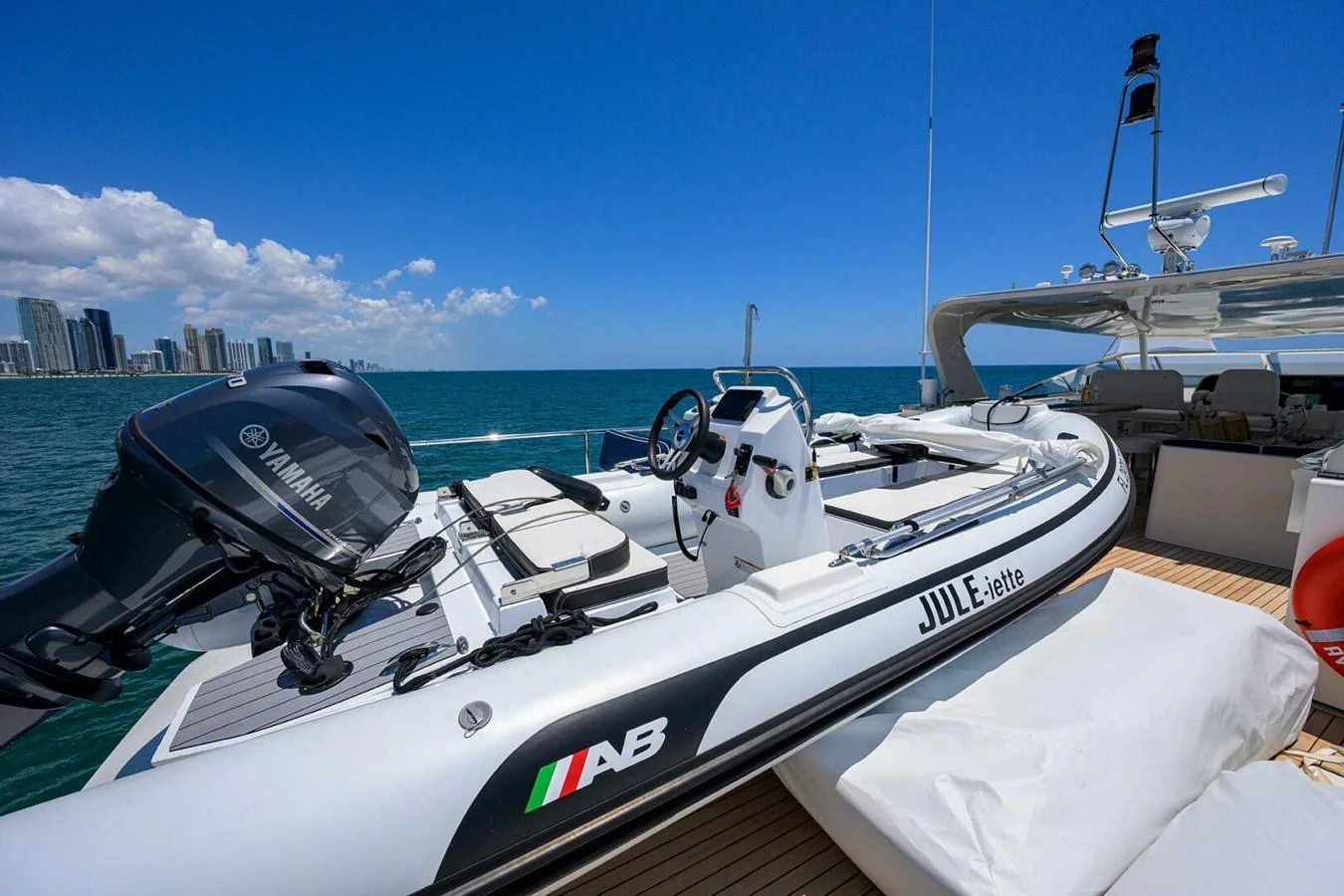 a boat with a satellite dish on the deck aboard JULE Yacht for Sale