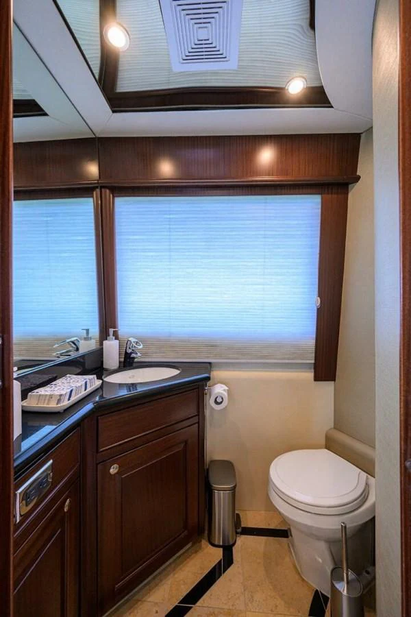 a bathroom with a sink and a toilet aboard JULE Yacht for Sale