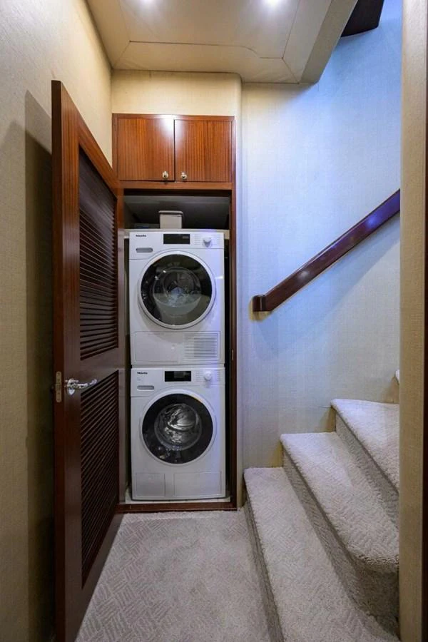 a washer and dryer in a room aboard JULE Yacht for Sale
