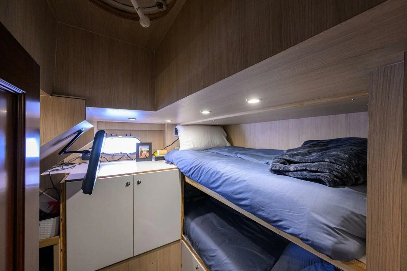 a bed in a room aboard JULE Yacht for Sale